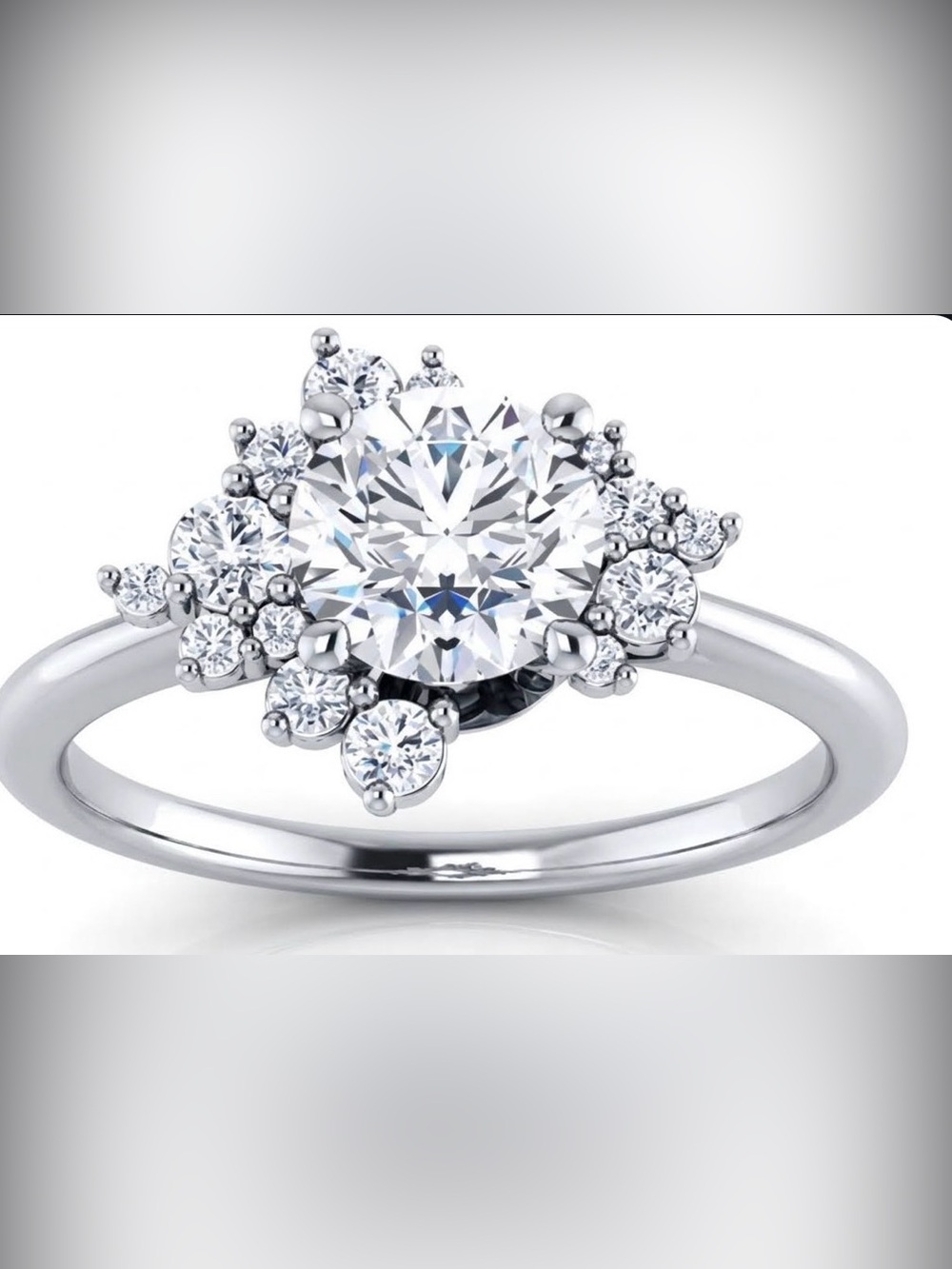 Moissanite solitaire engagement or right hand ring with asymmetrical setting.